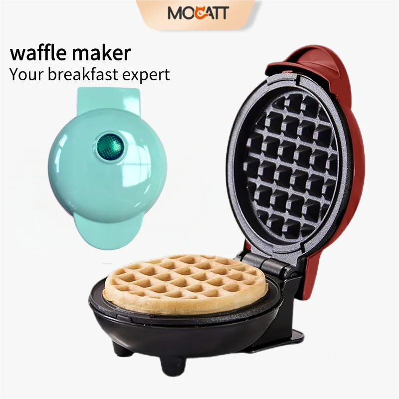 Waffle maker with a waffle inside, branded as Mocatt, on a white background.