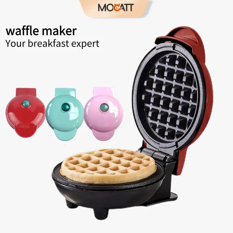 Waffle maker with a cooked waffle inside, colorful buttons on a white background, featuring the Mocatt brand.