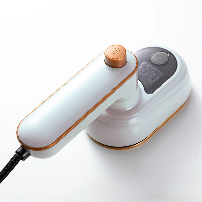 Portable steamer as part of a travel essentials setup