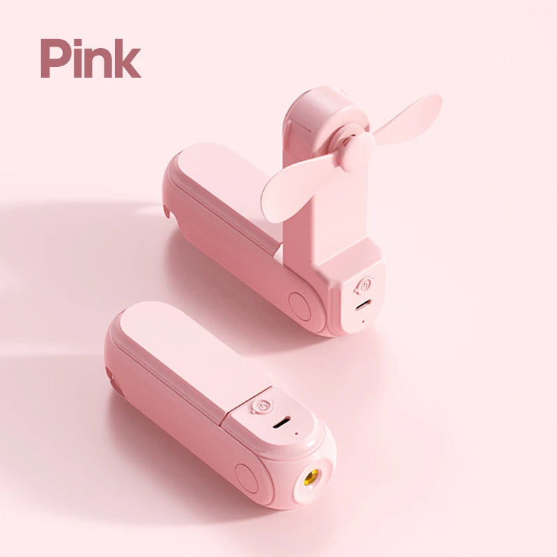 Pink compact mini fan by Kinscoter with flashlight and USB port