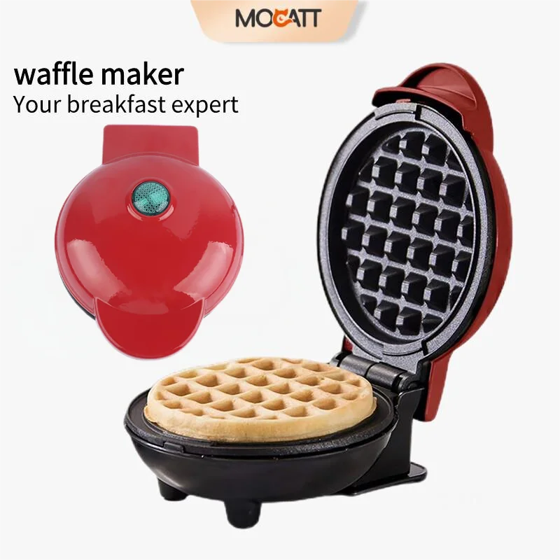 Waffle maker with a cooked waffle inside, branded as Mocatt.