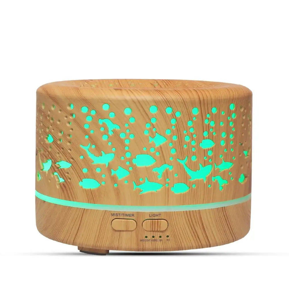 Close-up of wood grain diffuser with glowing LED lights and buttons